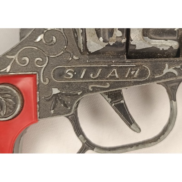 Pistolet jouet à amorce...