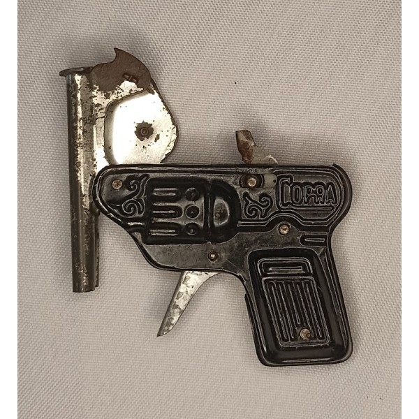 Pistolet jouet à amorce...