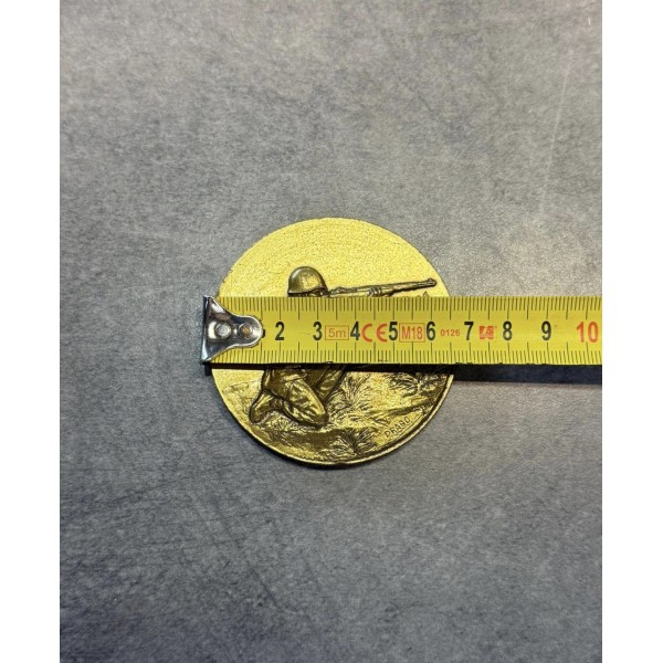 Médaille de table tireur...