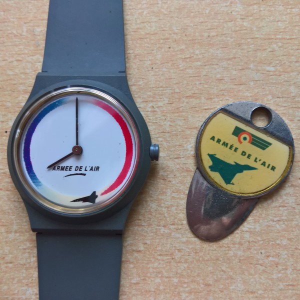 Lot montre et jeton de... Lot montre et jeton de...