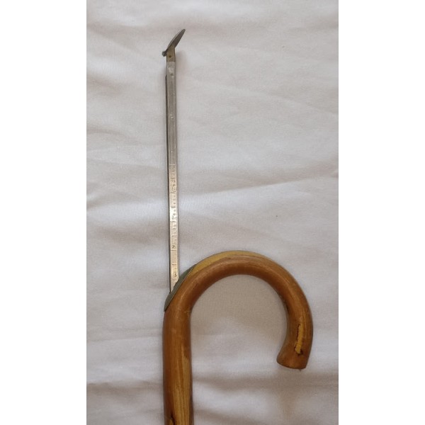 Canne d'arpenteur à système de mesure