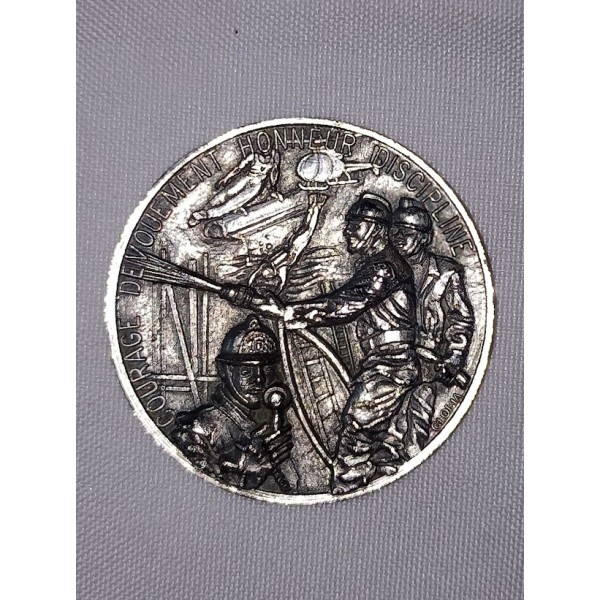 Médaille courage dévouement...
